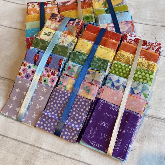 A set of 2.5" Rainbow Charm scrap packs - perfect for A Rainbow Project