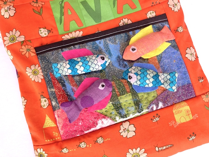 close up of the fish tank on the side of the homemade tote bag