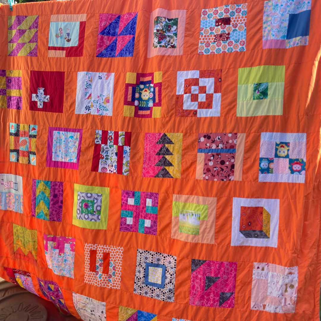 100 blocks Orange quilt