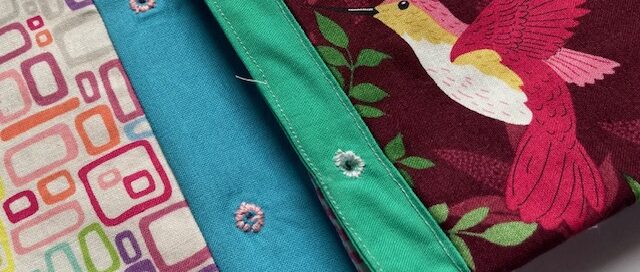 Button Holes in a fabric folder