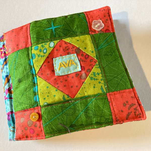 Avas patchwork cover of her Games Book